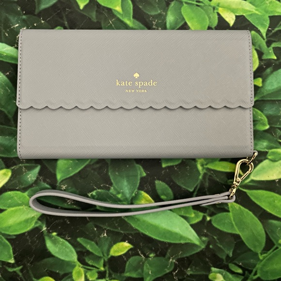 kate spade Handbags - Kate spade phone and card wristlet